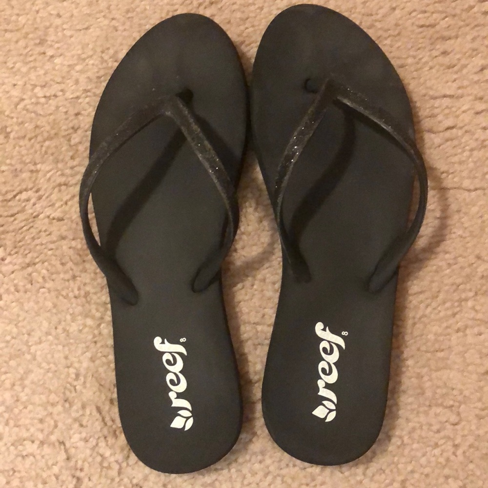 Black REEF flip flops